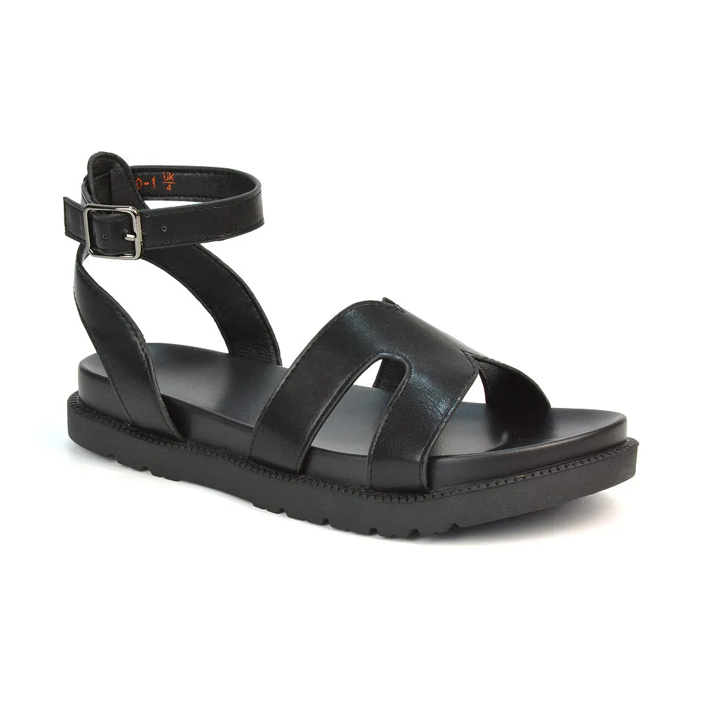 Eboni Ankle Strap Flatform Cut Out Flat Festival Sandals in Black Synthetic Leather