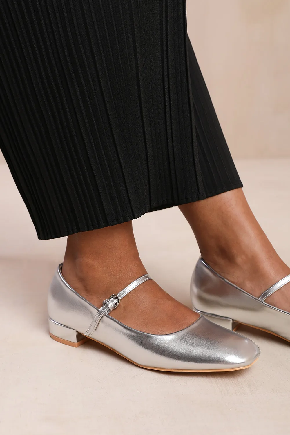 MINSK WIDE FIT LOW HEEL WITH STRAP AND BUCKLE DETAIL IN SILVER FAUX LEATHER