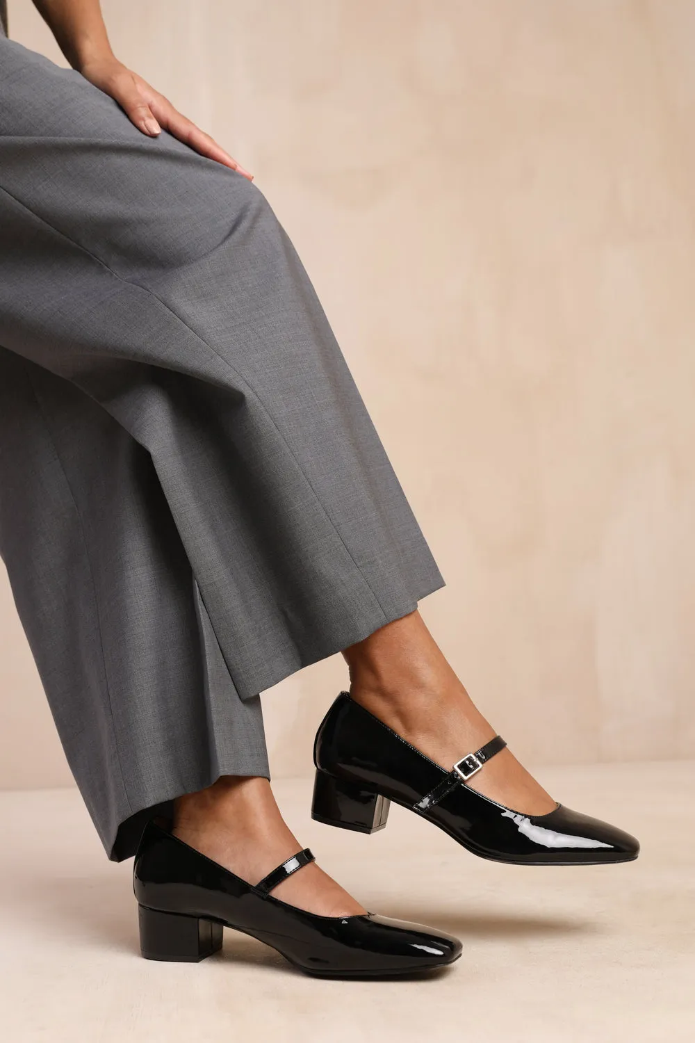 OSLO WIDE FIT LOW BLOCK HEEL WITH STRAP AND SQUARE TOE IN BLACK PATENT